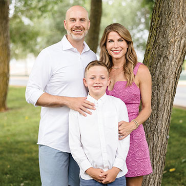 Aaron and Lenice Cattley with their son Greyson ’33. Links to their story