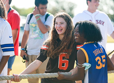 Photo of students playing tug-of-war.